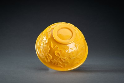 Lot 48 - AN OPAQUE YELLOW GLASS BOWL WITH BUDDHIST SYMBOLS, QING
