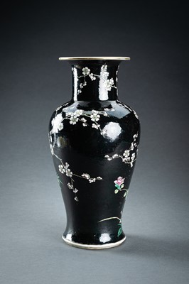 Lot 1283 - A FAMILLE NOIR BALUSTER VASE, QING