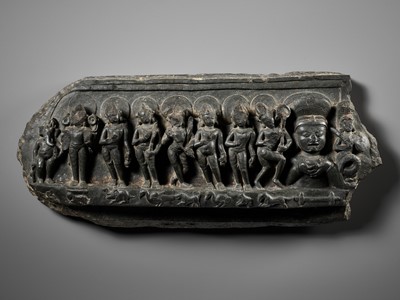 Lot 195 - A BASALT RELIEF DEPICTING GANESHA AND THE NINE PLANETS (NAVAGRAHA), 10TH-11TH CENTURY