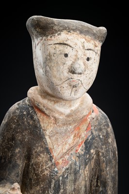 Lot 298 - A POTTERY FIGURE OF A WARRIOR, HAN DYNASTY