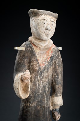 Lot 298 - A POTTERY FIGURE OF A WARRIOR, HAN DYNASTY