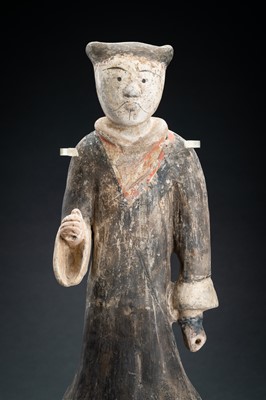 Lot 298 - A POTTERY FIGURE OF A WARRIOR, HAN DYNASTY