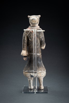 Lot 298 - A POTTERY FIGURE OF A WARRIOR, HAN DYNASTY