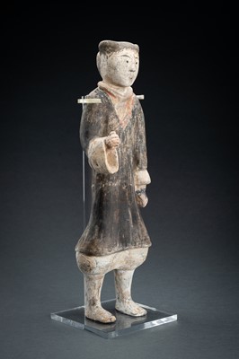 Lot 298 - A POTTERY FIGURE OF A WARRIOR, HAN DYNASTY