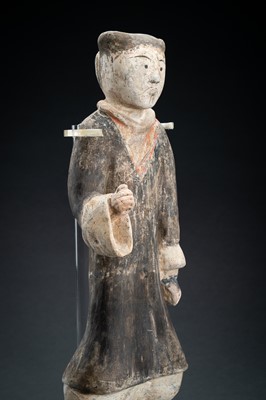 Lot 298 - A POTTERY FIGURE OF A WARRIOR, HAN DYNASTY