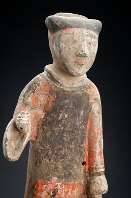 A POTTERY FIGURE OF A GUARD, HAN DYNASTY