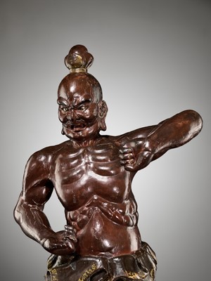 Lot 57 - A LARGE AND IMPRESSIVE LACQUERED WOOD FIGURE OF A NIO GUARDIAN