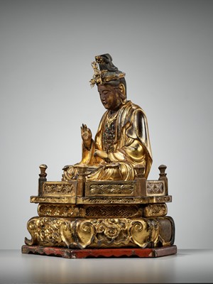 Lot 263 - A GILT WOOD FIGURE OF KANNON BOSATSU
