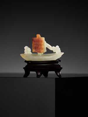 Lot 111 - A PALE CELADON AND RUSSET JADE CARVING OF A SAILING BOAT, QING DYNASTY
