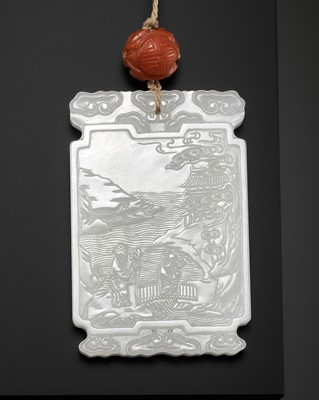 Lot 461 - A WHITE JADE ‘SCHOLAR’ PLAQUE, INSCRIBED WITH AN IMPERIAL POEM COMPOSED BY THE QIANLONG EMPEROR, LATE QING DYNASTY TO REPUBLIC PERIOD