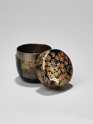 Lot 219 - KOZEN: A LACQUER NATSUME (TEA CADDY) WITH CHERRY BLOSSOMS BY A CASTLE WALL