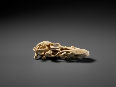 Lot 293 - KOZAN: AN IVORY OKIMONO OF THREE FIGHTING LIONS