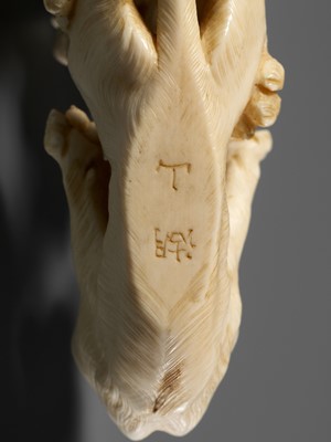 Lot 293 - KOZAN: AN IVORY OKIMONO OF THREE FIGHTING LIONS
