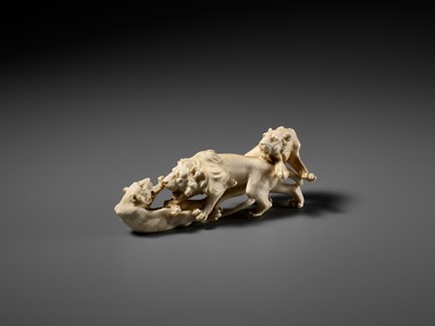 Lot 293 - KOZAN: AN IVORY OKIMONO OF THREE FIGHTING LIONS