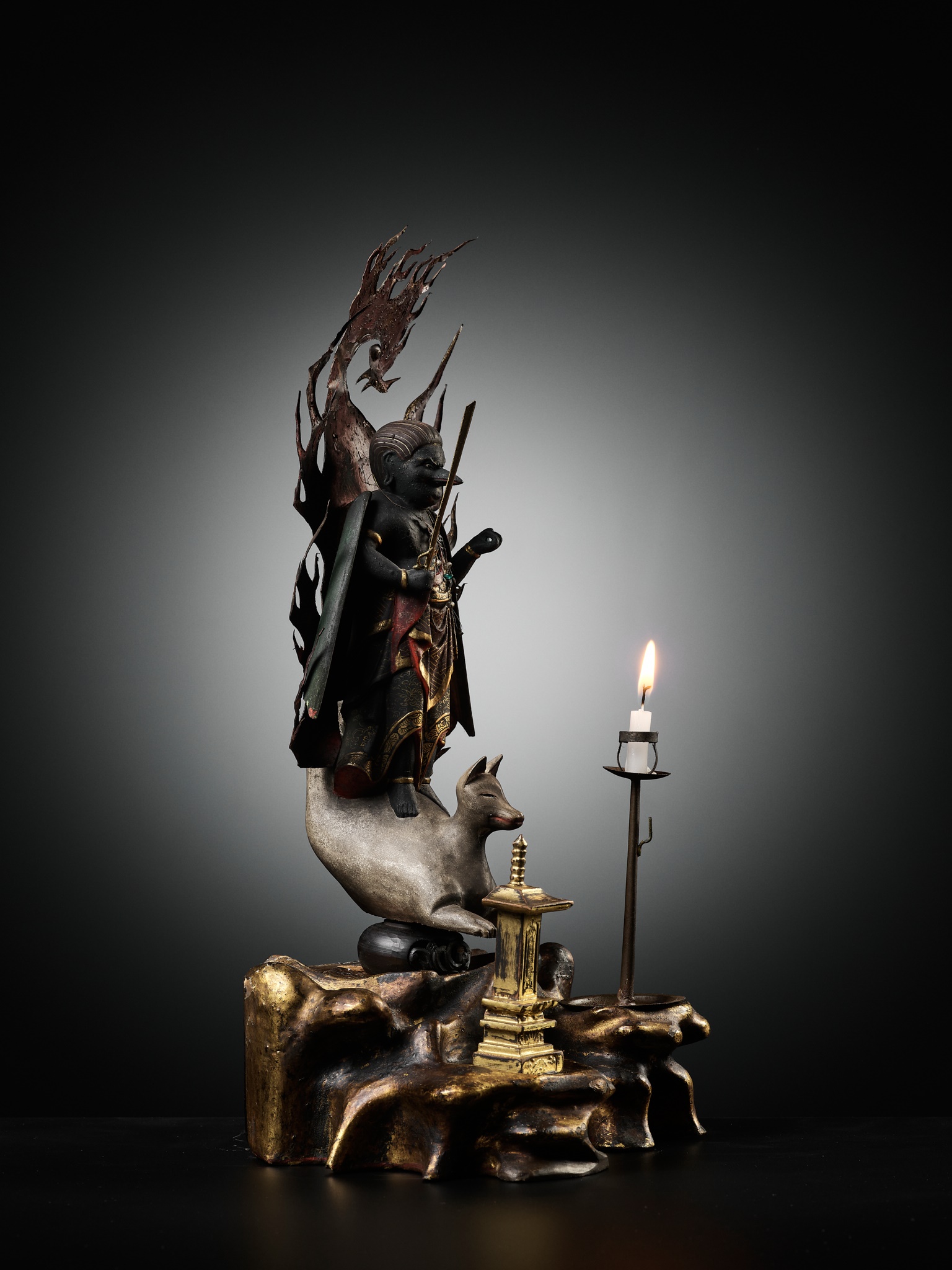 Lot 53 - A RARE GILT AND POLYCHROME WOOD FIGURE OF