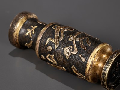 Lot 617 - A PARCEL-GILT BRONZE TOOL VASE BY HU WENMING, MING DYNASTY