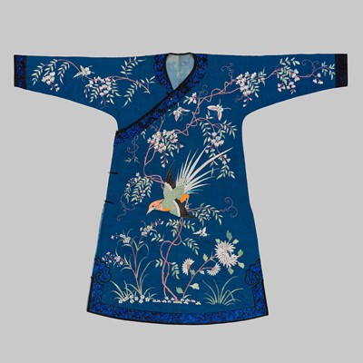 Lot 1128 - A BLUE-GROUND SILK EMBROIDERED ROBE, c. 1900
