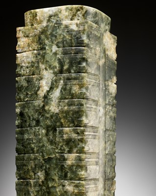 Lot 316 - A RARE AND MASSIVE NINE-TIERED GREEN AND RUSSET JADE CONG, LIANGZHU CULTURE OR LATER