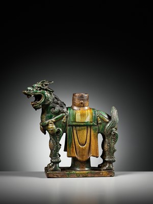 Lot 75 - A LARGE SANCAI GLAZED ‘BUDDHIST LION’ CANDLEHOLDER, MING DYNASTY
