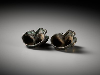 Lot 144 - A PAIR OF SILVER- AND GOLD-INLAID BRONZE ‘TIGER’ WEIGHTS, HAN DYNASTY