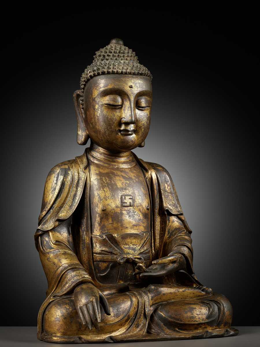 Lot 189 - A LARGE GILT BRONZE FIGURE OF BUDDHA, MING