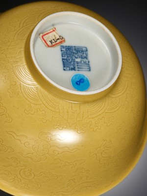 Lot 113 - AN IMPERIAL YELLOW-GLAZED AND INCISED ‘DRAGON’ BOWL, QIANLONG MARK AND PERIOD