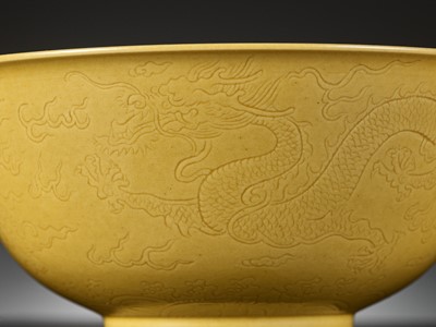 Lot 113 - AN IMPERIAL YELLOW-GLAZED AND INCISED ‘DRAGON’ BOWL, QIANLONG MARK AND PERIOD