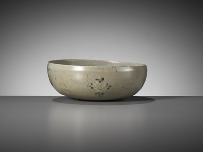 Lot 466 - A SLIP-INLAID CELADON-GLAZED STONEWARE ‘FLORAL’ BOWL, GORYEO DYNASTY