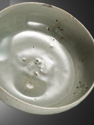 Lot 466 - A SLIP-INLAID CELADON-GLAZED STONEWARE ‘FLORAL’ BOWL, GORYEO DYNASTY