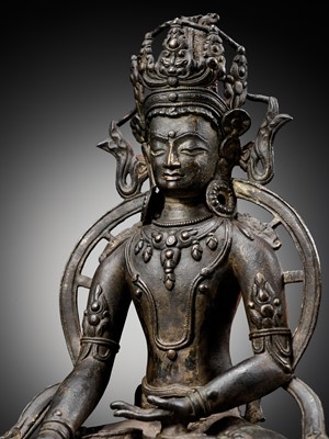 Lot 174 - A LARGE BRONZE FIGURE OF RATNASAMBHAVA, CENTRAL TIBET, 13TH-14TH CENTURY