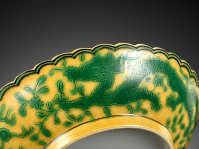 Lot 117 - A PAIR OF YELLOW-GROUND AND GREEN-ENAMELLED 'DRAGON' DISHES, QIANLONG MARK AND OF THE PERIOD