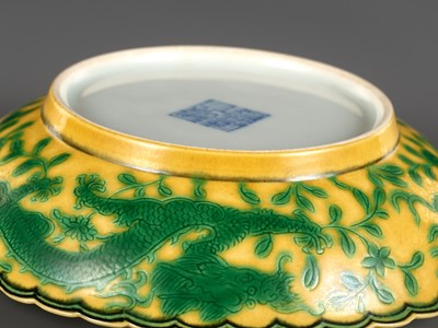 Lot 117 - A PAIR OF YELLOW-GROUND AND GREEN-ENAMELLED 'DRAGON' DISHES, QIANLONG MARK AND OF THE PERIOD