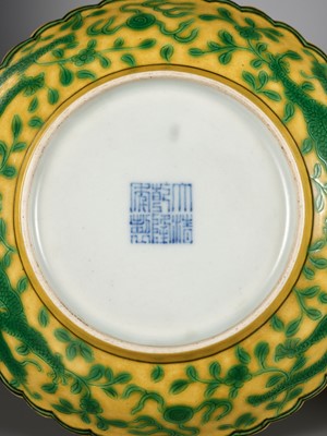 Lot 117 - A PAIR OF YELLOW-GROUND AND GREEN-ENAMELLED 'DRAGON' DISHES, QIANLONG MARK AND OF THE PERIOD