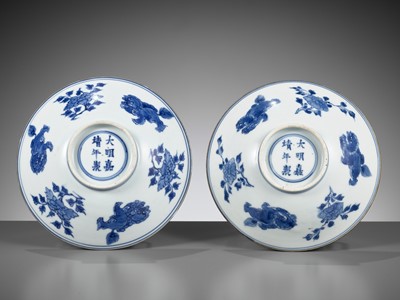 Lot 184 - A PAIR OF BLUE AND WHITE ‘LIONS AND PEONY’ PORCELAIN BOWLS, SHUNZHI TO KANGXI PERIOD