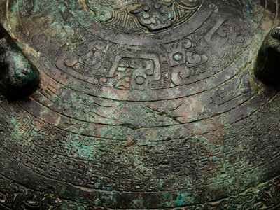 Lot 143 - A LARGE INSCRIBED BRONZE RITUAL FOOD VESSEL AND COVER, DING, SPRING AND AUTUMN PERIOD