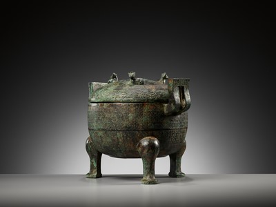 Lot 143 - A LARGE INSCRIBED BRONZE RITUAL FOOD VESSEL AND COVER, DING, SPRING AND AUTUMN PERIOD