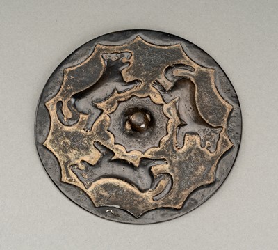 Lot 141 - A RARE TANG DYNASTY BRONZE MIRROR WITH WOLFES