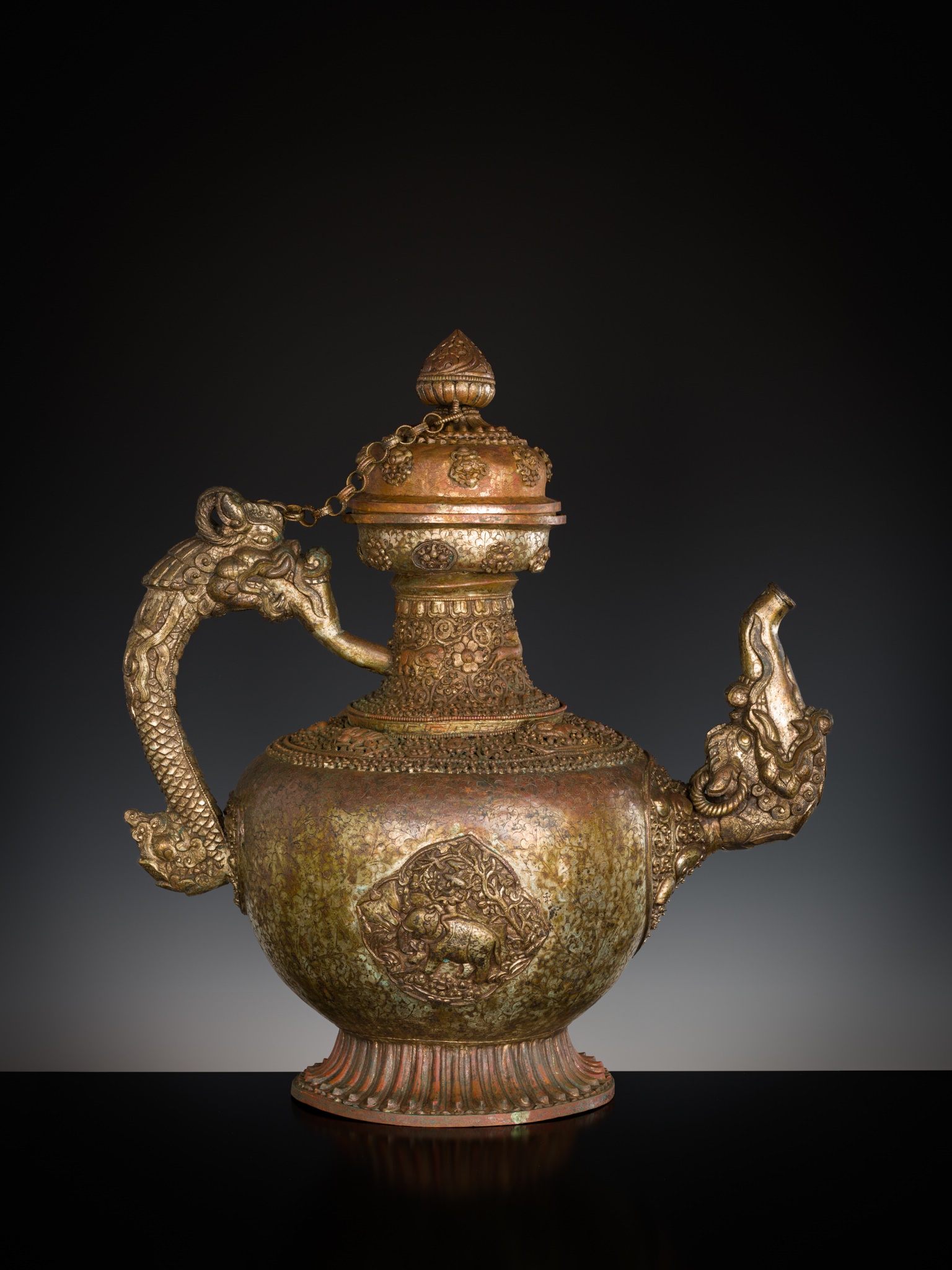 Lot 1061 - A MASSIVE SILVERED-COPPER RITUAL TEAPOT AND