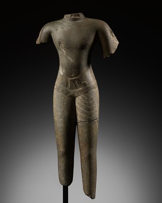 Lot 272 - A GRAY SANDSTONE TORSO OF A MALE DEITY, ANGKOR PERIOD, BAPHUON STYLE