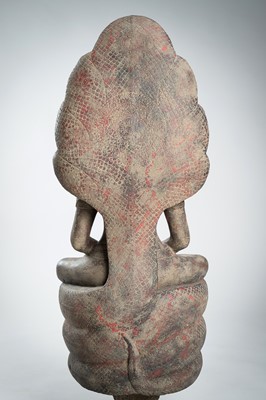 Lot 1435 - AN ANGKOR-STYLE STONE FIGURE OF BUDDHA MUCHALINDA