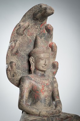 Lot 1435 - AN ANGKOR-STYLE STONE FIGURE OF BUDDHA MUCHALINDA