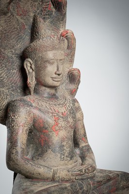 Lot 1435 - AN ANGKOR-STYLE STONE FIGURE OF BUDDHA MUCHALINDA