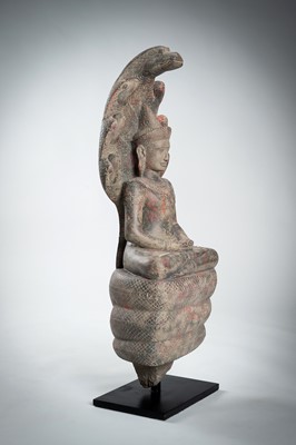 Lot 1435 - AN ANGKOR-STYLE STONE FIGURE OF BUDDHA MUCHALINDA