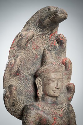 Lot 1435 - AN ANGKOR-STYLE STONE FIGURE OF BUDDHA MUCHALINDA