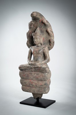 Lot 1435 - AN ANGKOR-STYLE STONE FIGURE OF BUDDHA MUCHALINDA