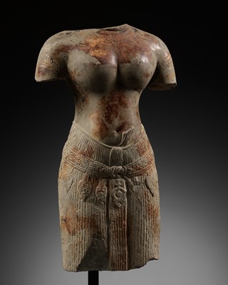 Lot 271 - A SANDSTONE TORSO OF A FEMALE DEITY, ANGKOR PERIOD, BAPHUON STYLE