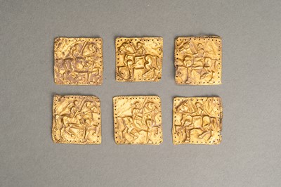 Lot 764 - A GROUP OF SIX ACHAEMENID GOLD PLAQUES WITH WARRIORS ON HORSEBACK