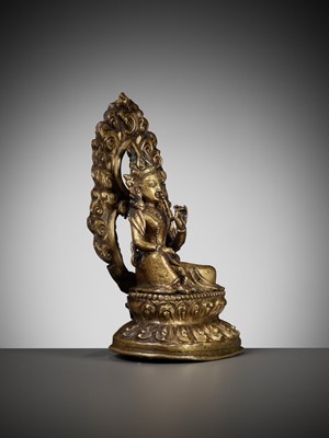 Lot 673 - A GILT COPPER REPOUSSÉ FIGURE OF TARA, NEPAL, 18TH-19TH CENTURY