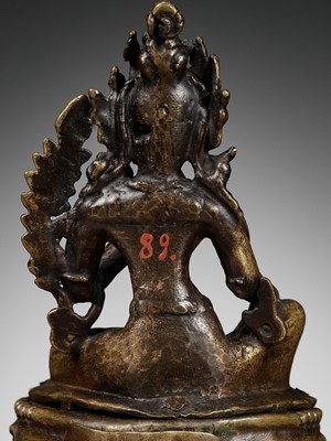 Lot 673 - A GILT COPPER REPOUSSÉ FIGURE OF TARA, NEPAL, 18TH-19TH CENTURY