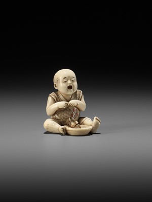 Lot 254 - GYOKUSUI: AN AMUSING IVORY NETSUKE OF A CRYING INFANT AND CRAB